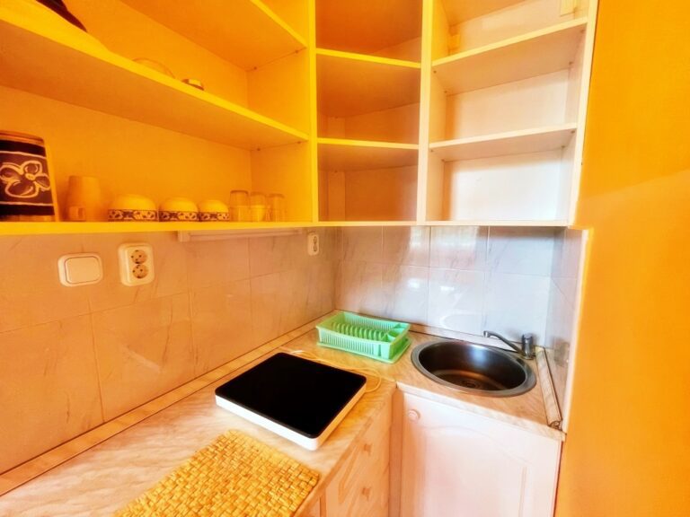 Modern kitchen setup in a flat’s living space.