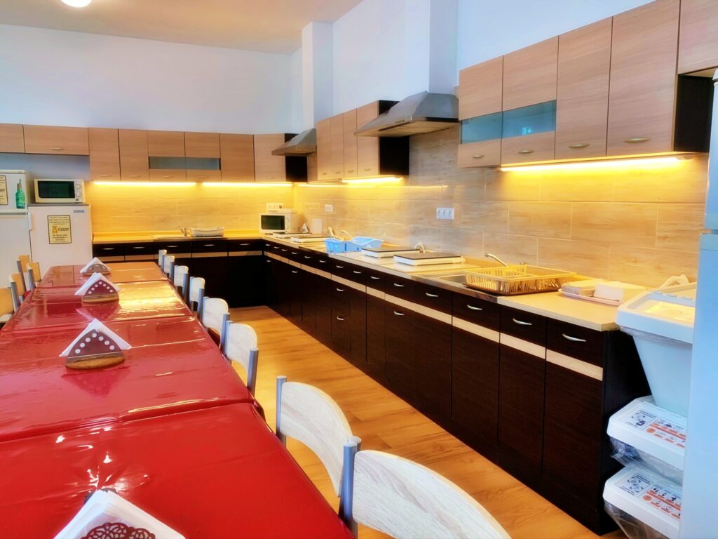 Modern dining area and kitchen setup.