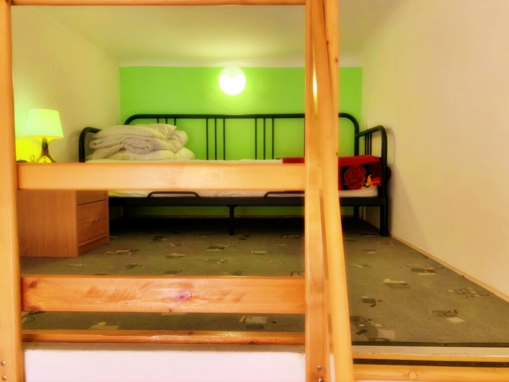 Modern bedroom with sleek design features.