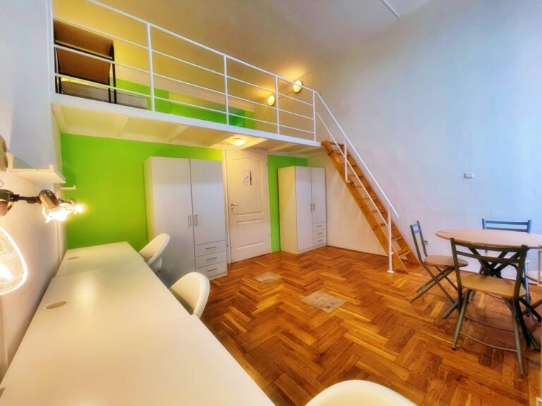 Spacious living room with modern furnishings.