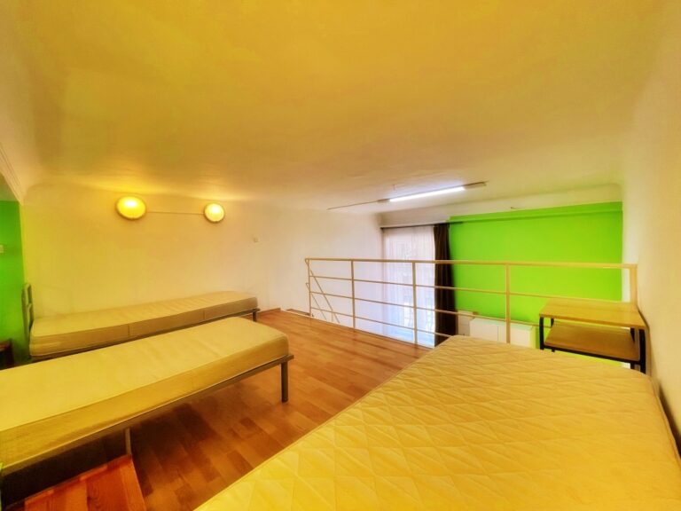 Interior view of a contemporary flat’s bedroom.