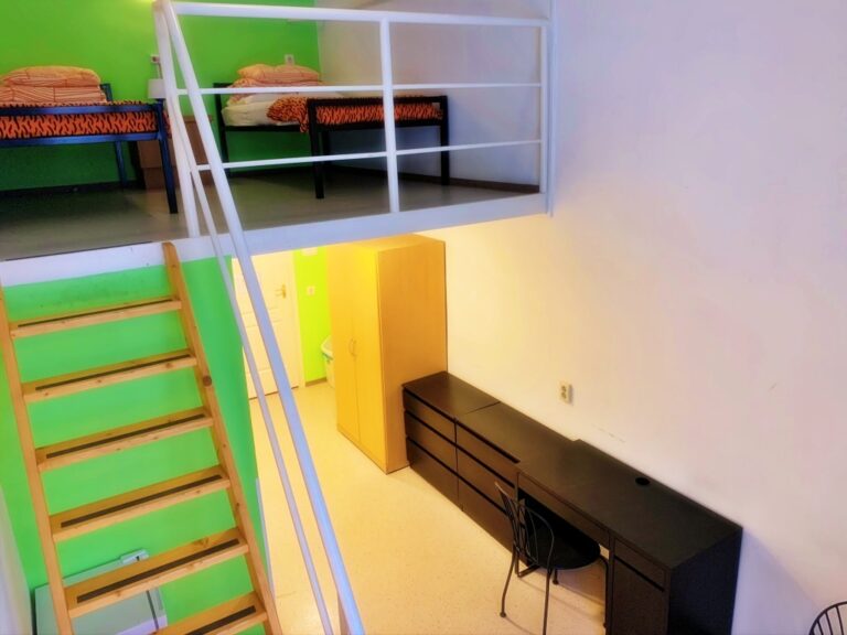 Stylish bedroom with sleek design features.