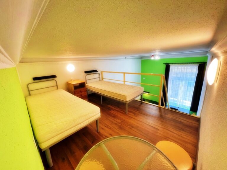 Modern bedroom with contemporary furnishings.