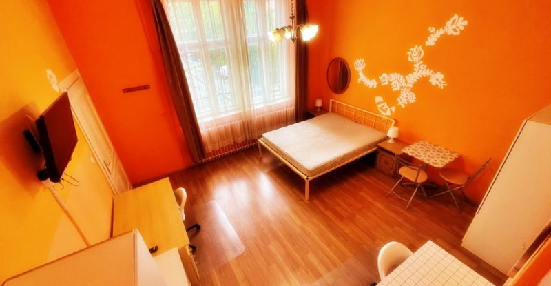 Spacious bedroom with contemporary design elements.