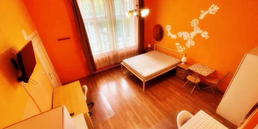 Spacious bedroom with contemporary design elements.